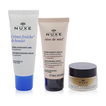 Nuxe Moisture Me Kit: Crema idratante Creme Fraiche De Beaute 48 ore 30 ml + Balsamo labbra al miele Reve De Miel 15 g + Crema mani e unghie Reve De Miel 30 ml