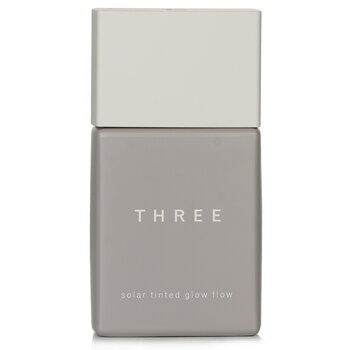 THREE Fondotinta liquido Solar Tinted Glow Flow SPF 50 - # 04